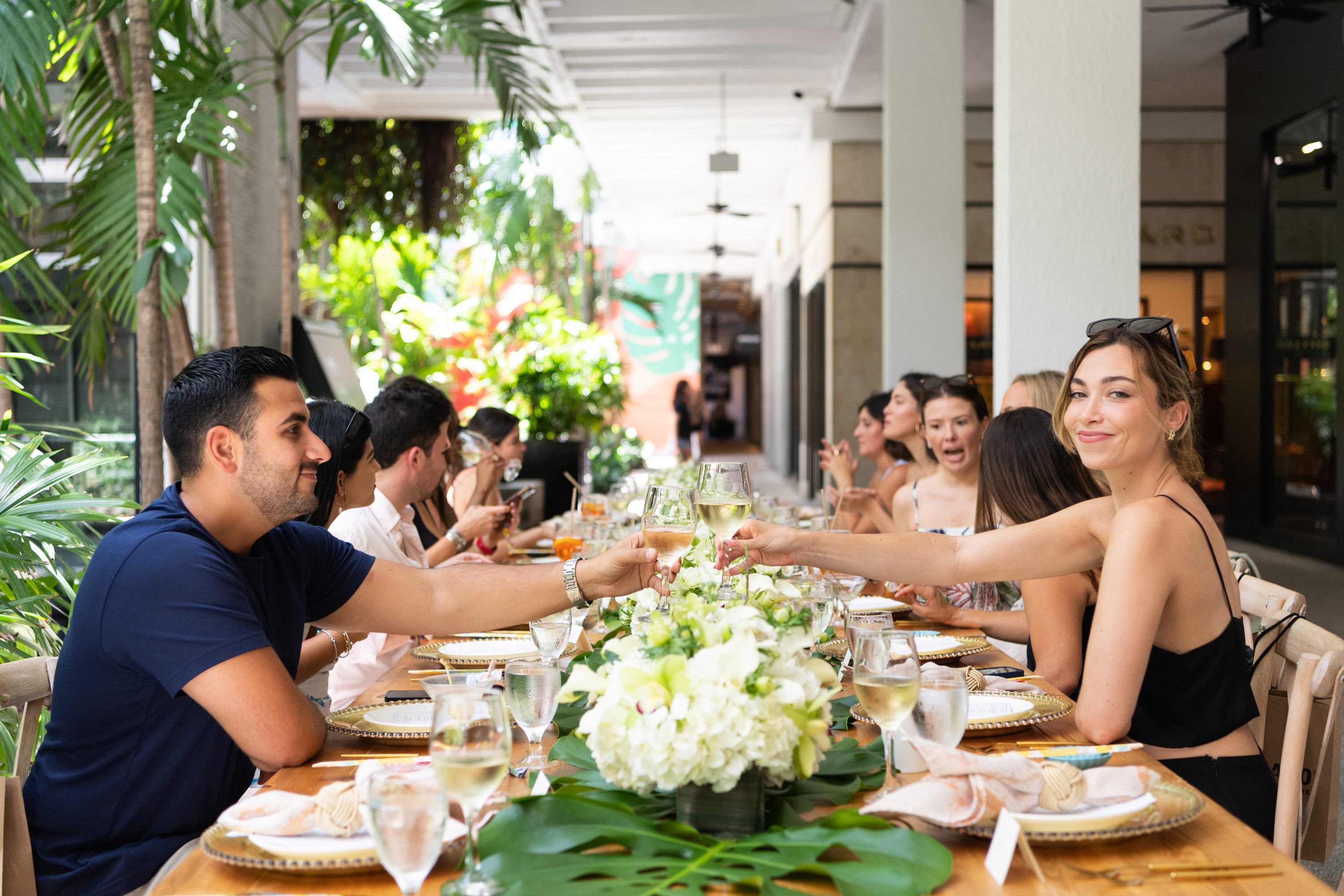 A variety of images showcasing “A Taste of Bal Harbour Shops”. Images include guests in attendance, table décor, and food featured at the event.