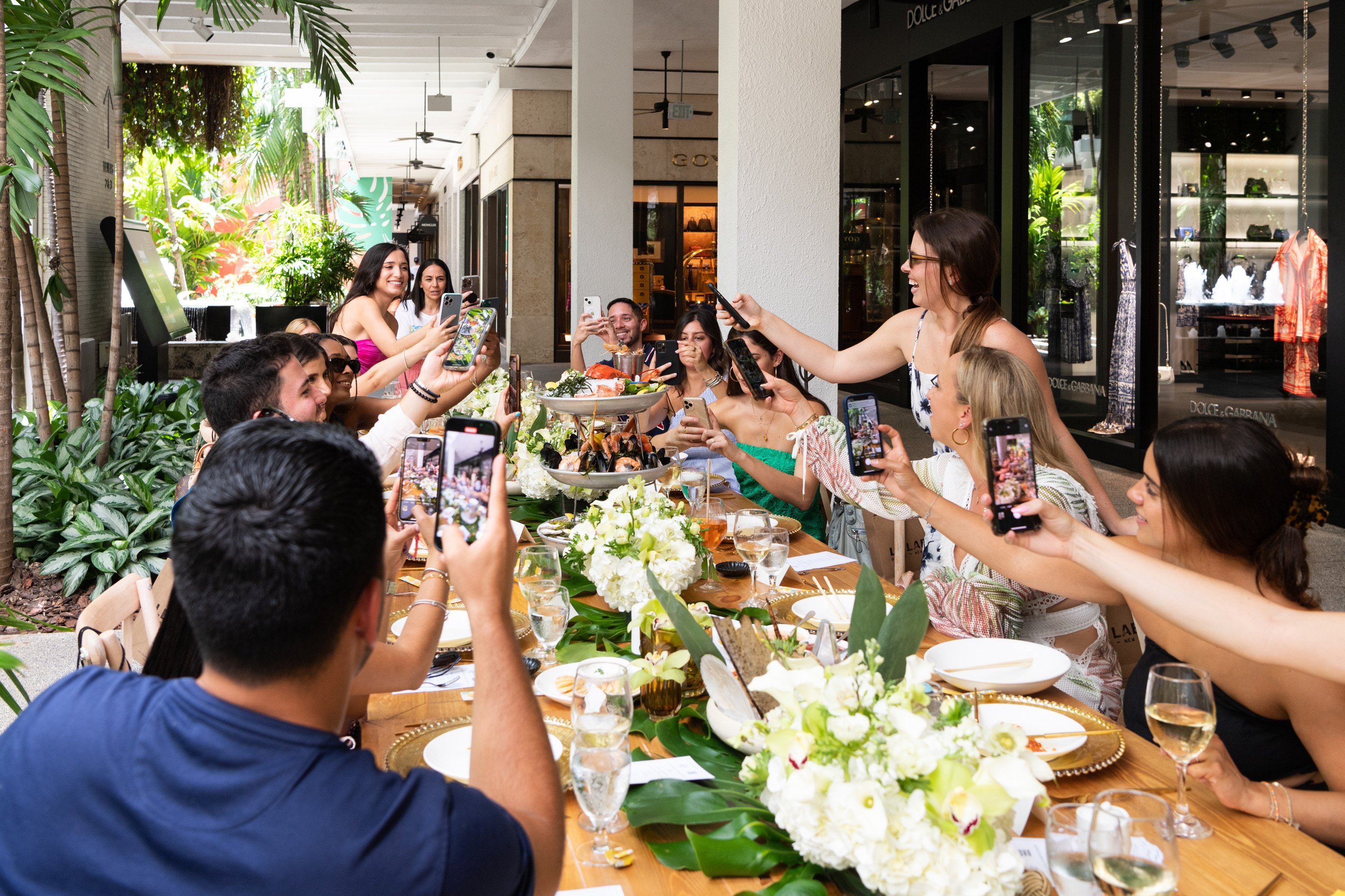 A variety of images showcasing “A Taste of Bal Harbour Shops”. Images include guests in attendance, table décor, and food featured at the event.