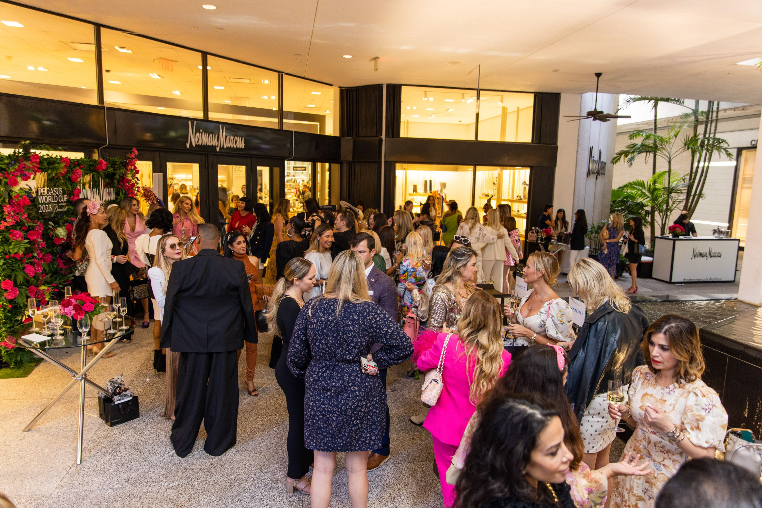 A variety of images showcasing the annual Pegasus World Cup “Off To The Races” fashion show. Images include guests in attendance, models walking the runway in looks from Neiman Marcus, and overall event atmosphere.