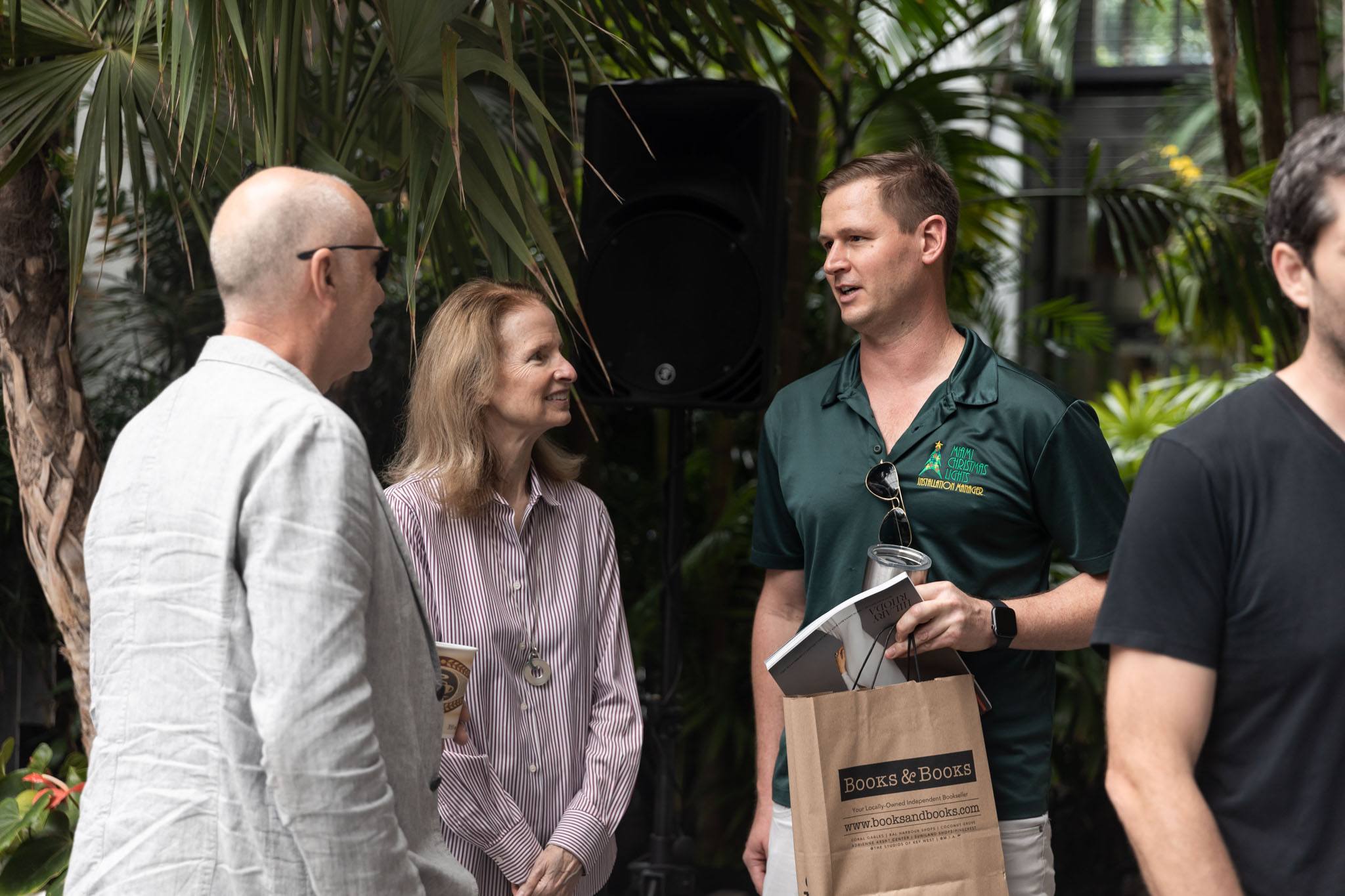 A variety of images showcasing the event with Raymond Jungles. Images include guests in attendance, event décor, and brunch bites provided by Le Zoo.