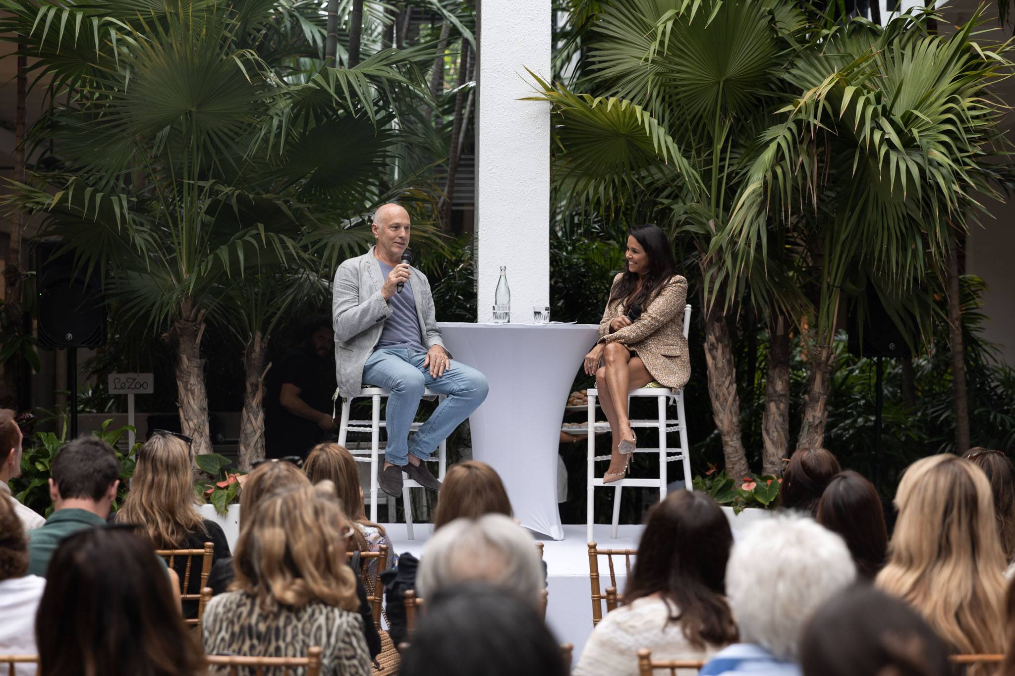 A variety of images showcasing the event with Raymond Jungles. Images include guests in attendance, event décor, and brunch bites provided by Le Zoo.