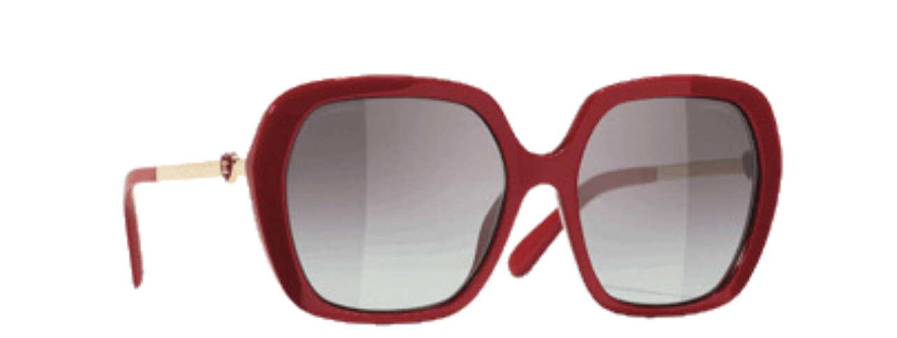 A pair of red square Chanel sunglasses