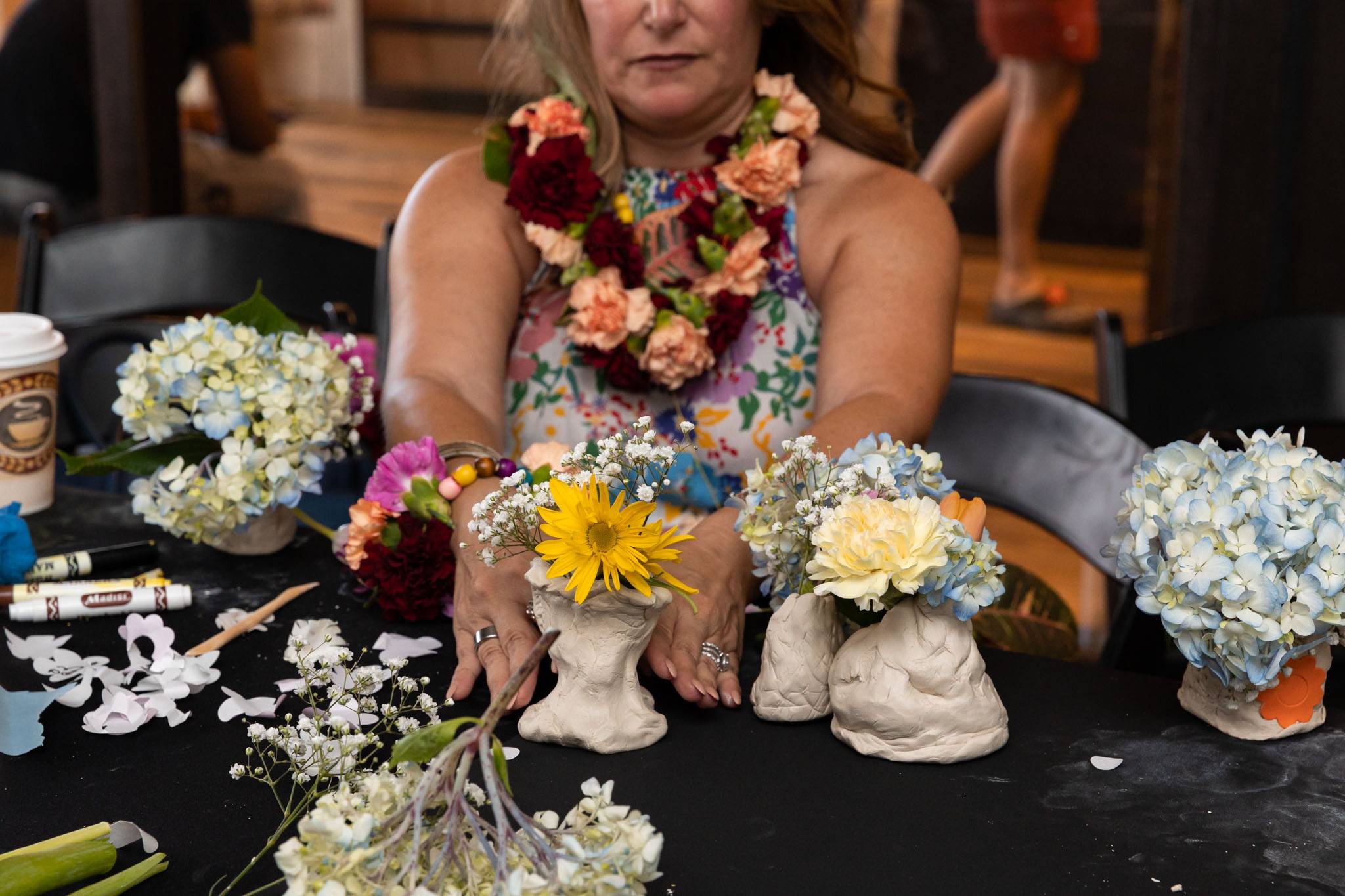 assortment of clay floral vases