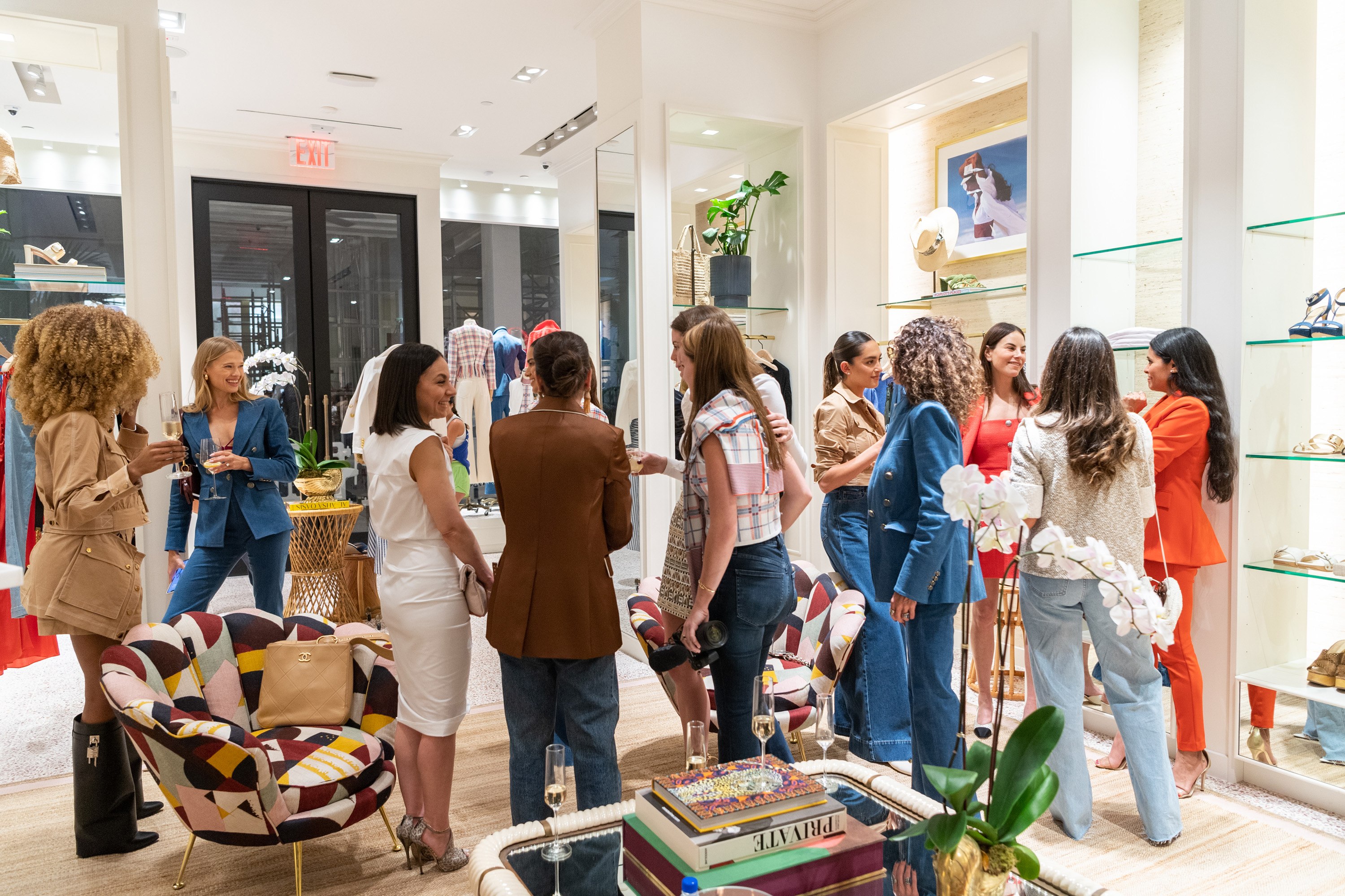 Guests mingling in the new Veronica Beard boutique located on Level 2 of Bal Harbour Shops