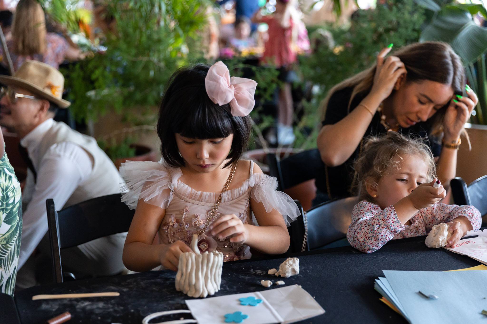 Luna Baik designing a clay floral vase