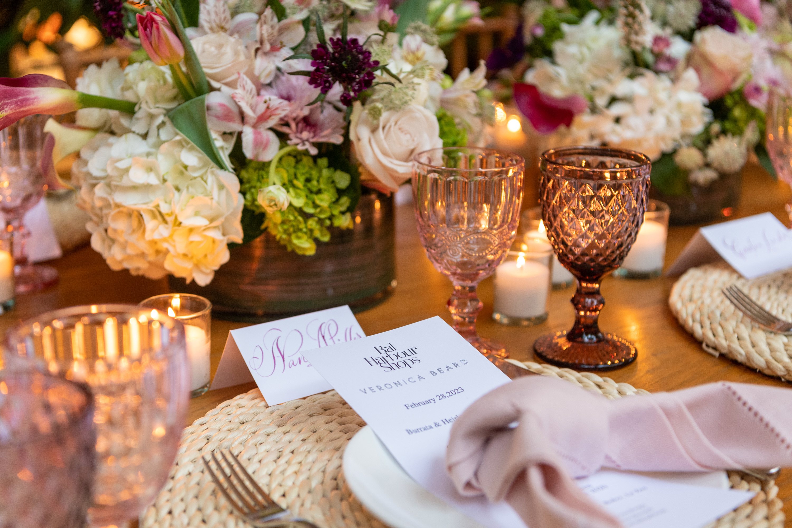 Table setting details including menu, decor, placecards, and florals.