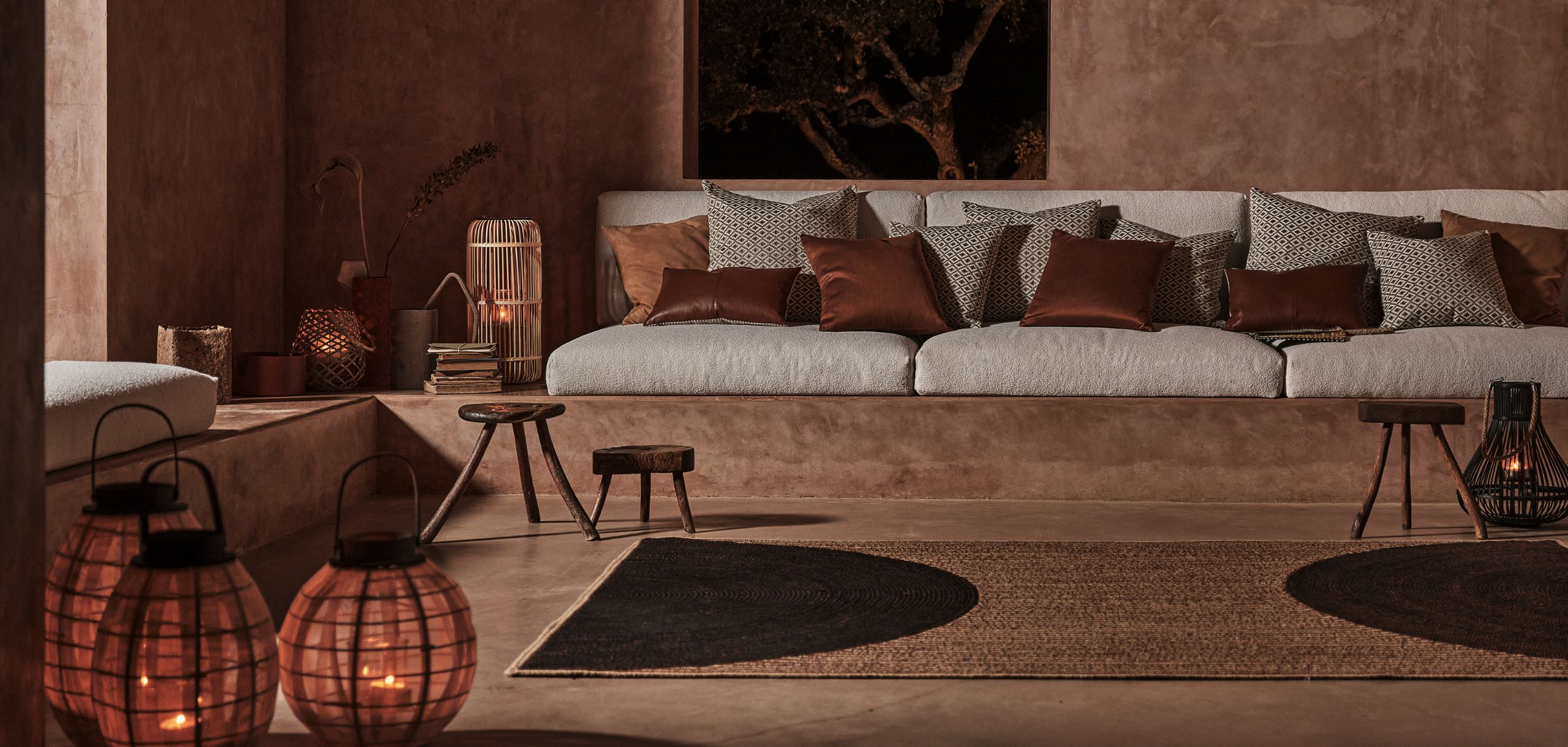 A moody living room styled by Frette’s Luxury Earth, Domino collection