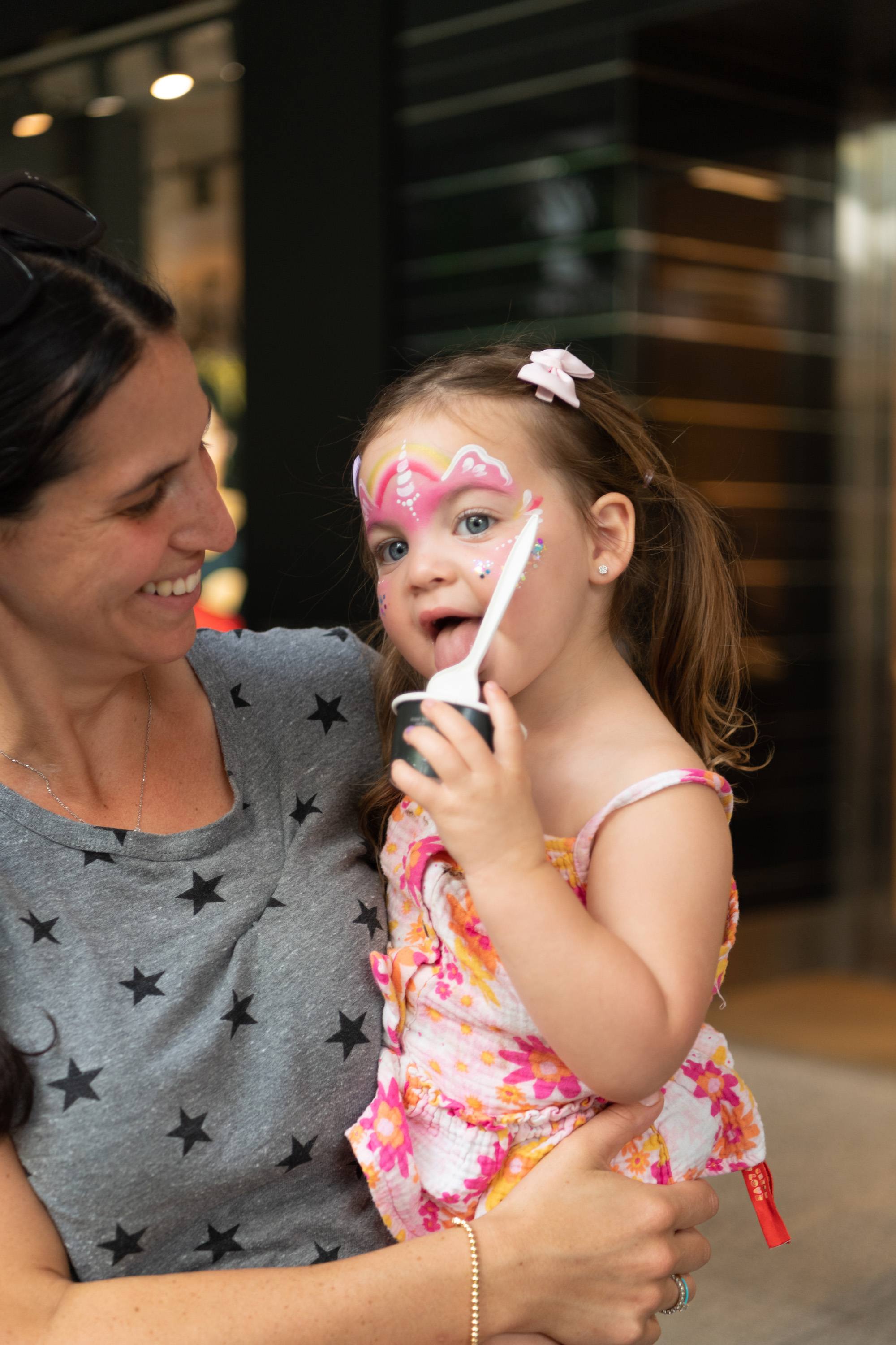 Raquel Genet and daughter enjoying ice cream offerings at Ice Cream We Love