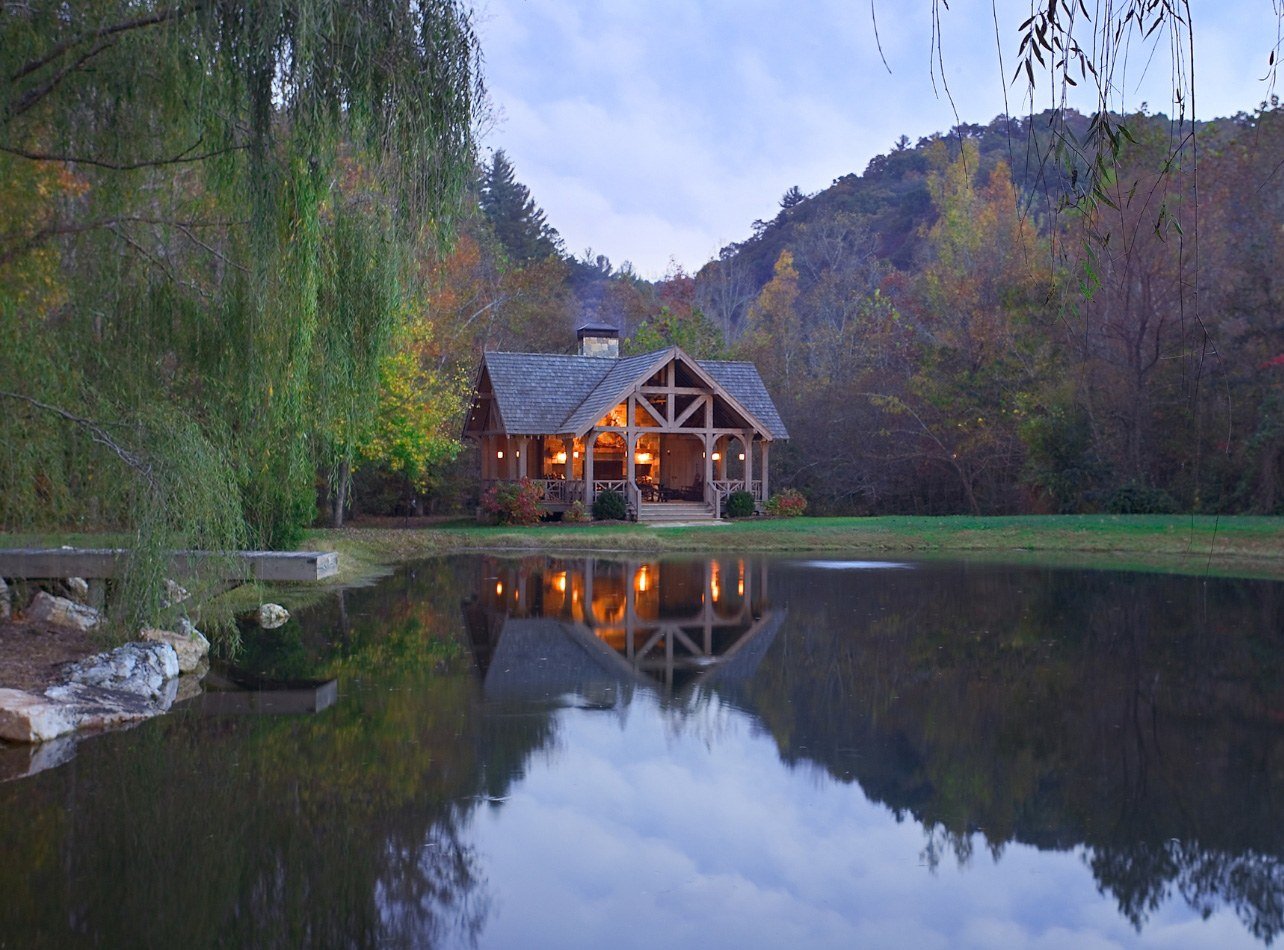 View of a cabin at Yellowhammer Pond at Blackberry Farm