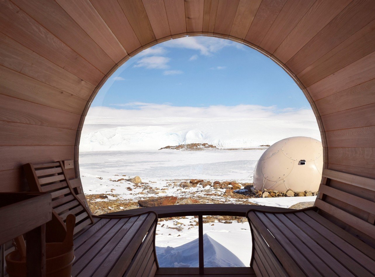 A barrel sauna at Whichaway, one of White Desert’s camps, overlooks a perma-frozen lake and glacier
