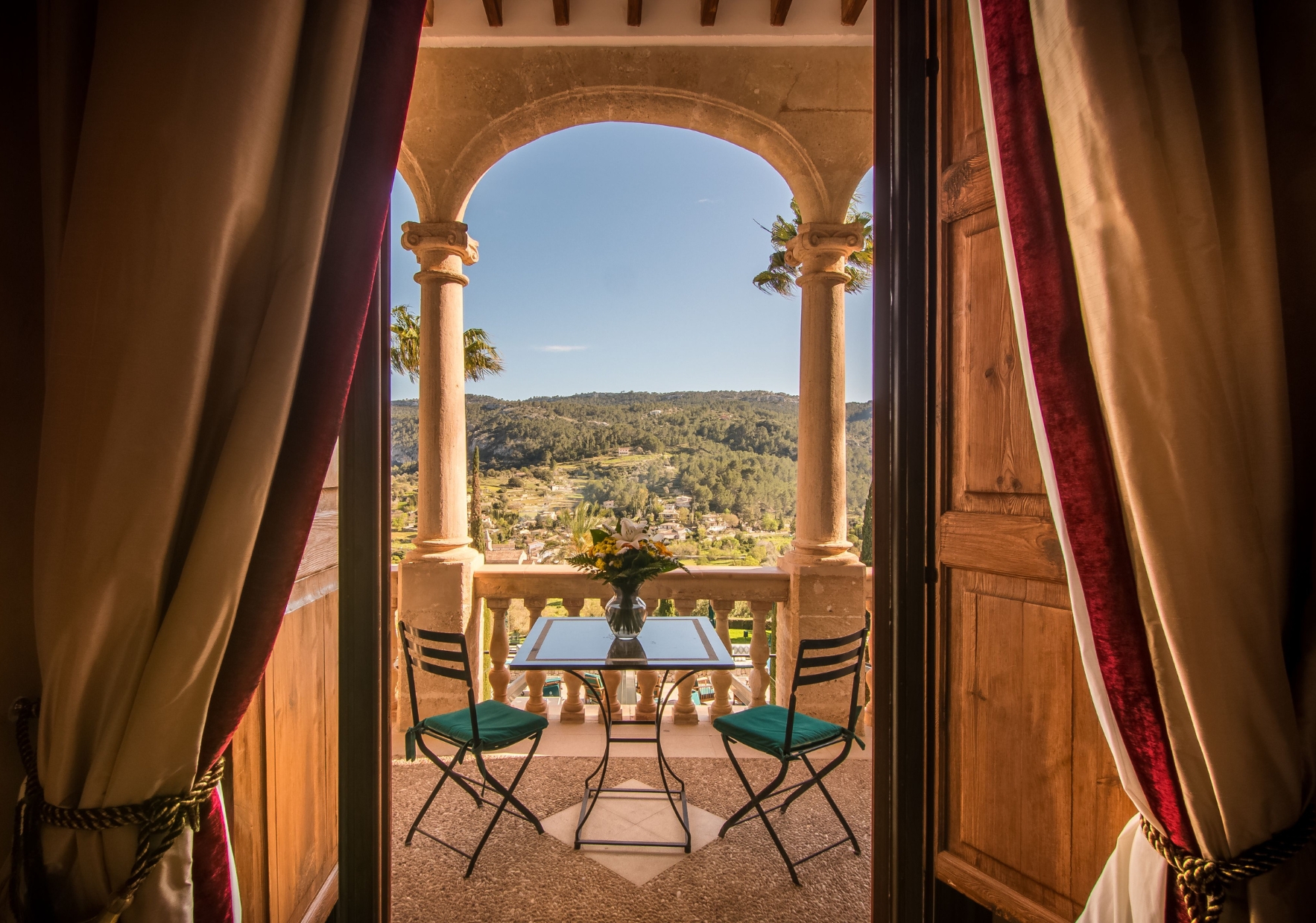 Image of the hillside view of Mallorca from a terrace suite at Son Net