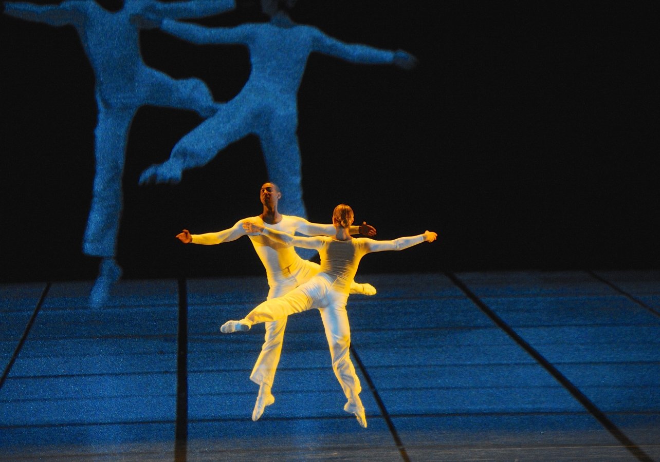 Dancers performing on stage; Dance by Lucinda Childs