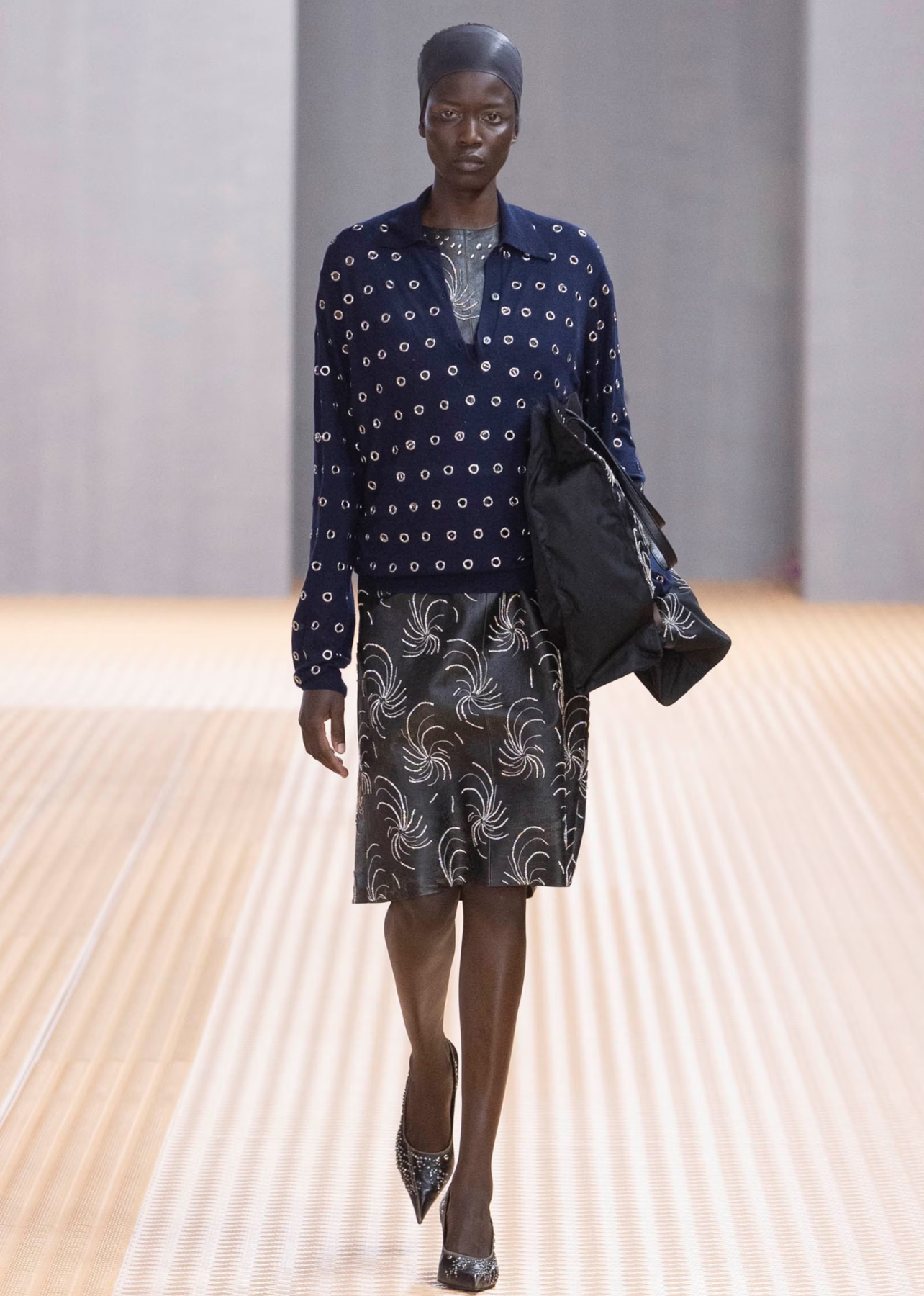 : Model on the runway for Prada from the Spring 2024 show at Milan Fashion Week