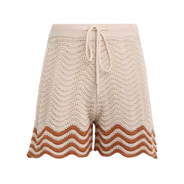 Zimmermann Junie textured knit shorts in cream with rust accents