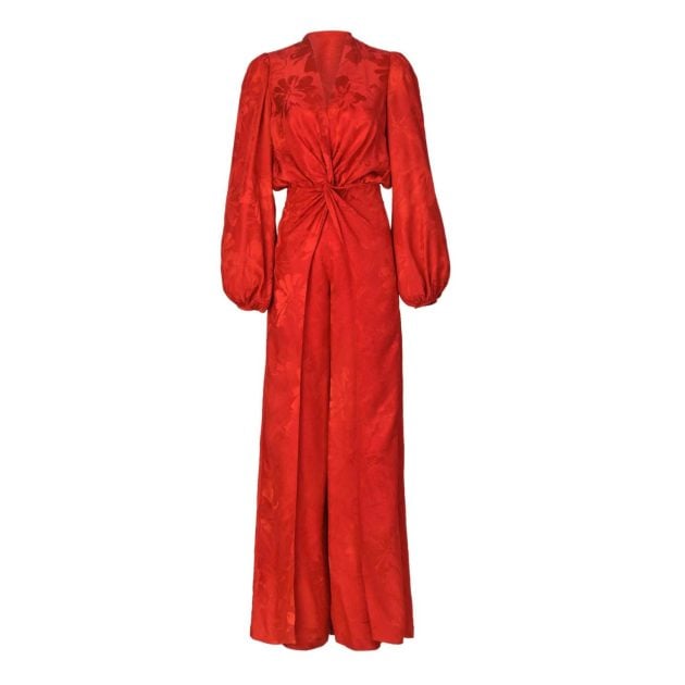 Red satin floral jacquard jumpsuit with long wide sleeve and plunging neckline