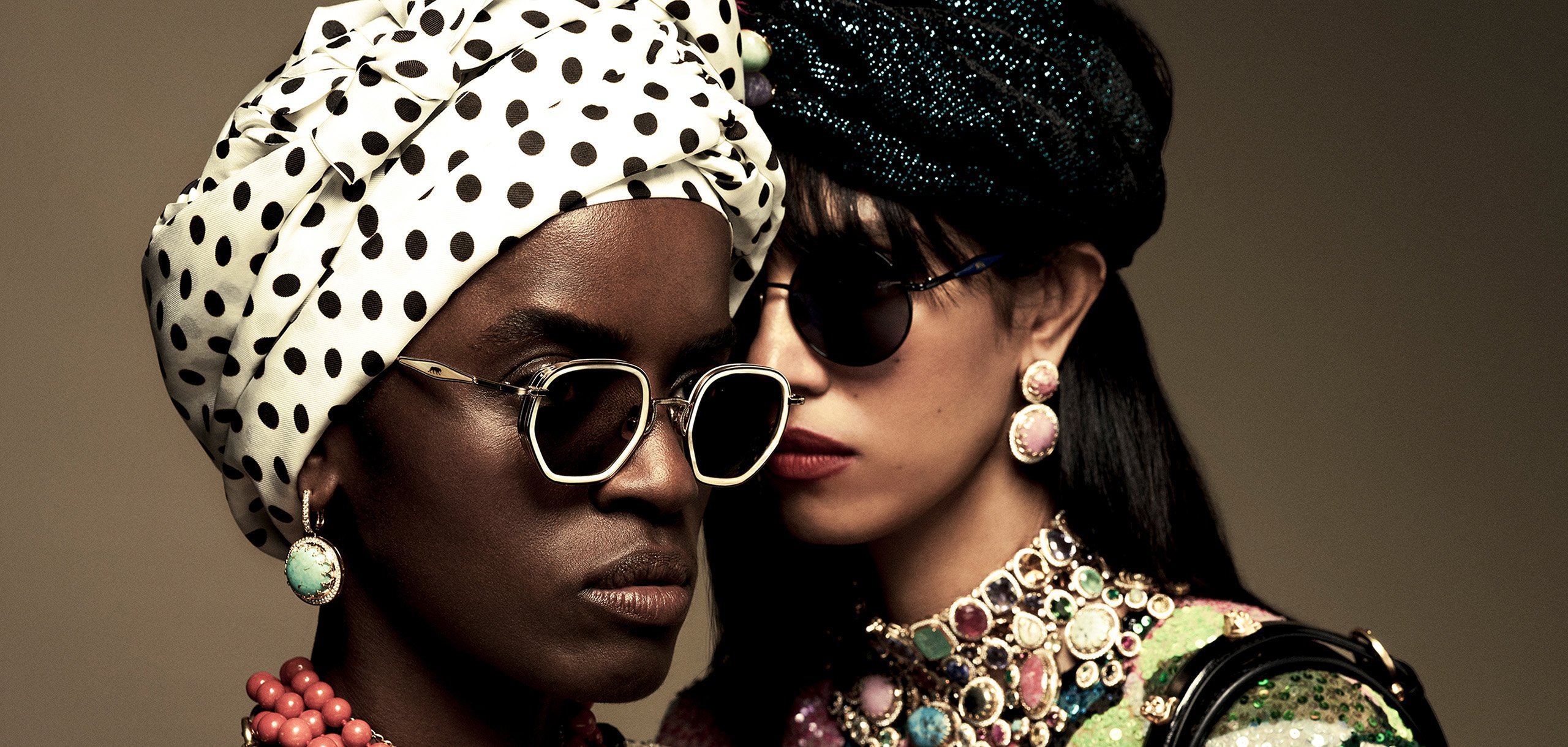 Portrait of models up-close wearing Morgenthal Frederics sunglasses styled with crystal and stone jewelry