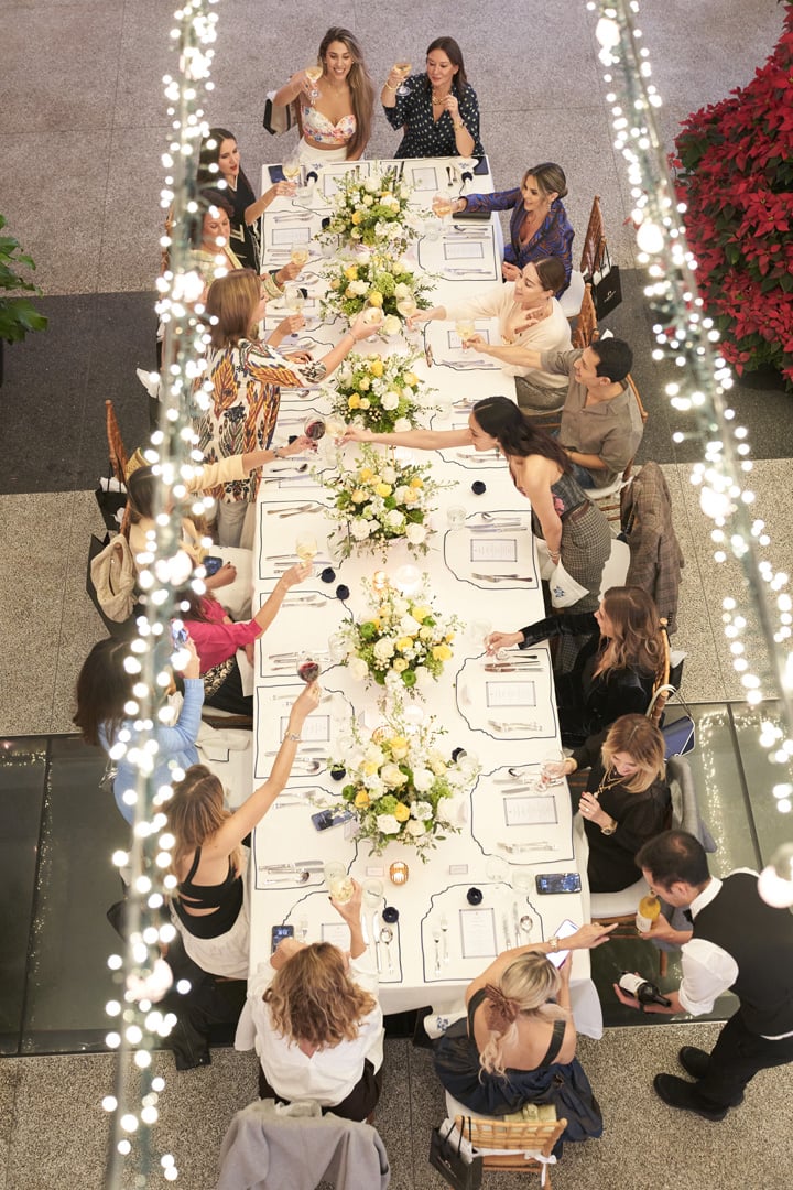 Guests gathered around a custom table scape at Le Zoo in Bal Harbour Shops