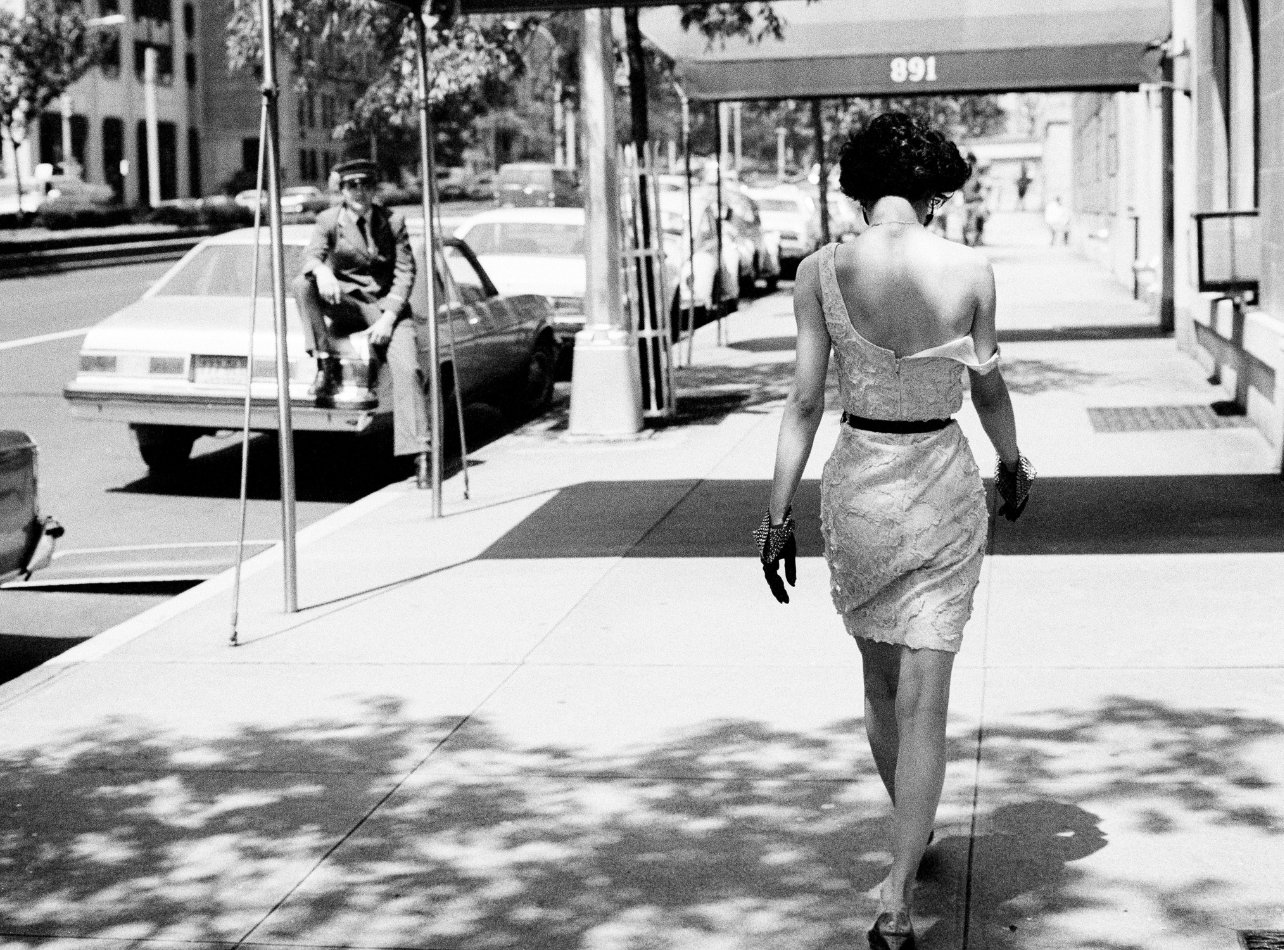 Black and white portrait of Wendy Whitelaw walking in New York City