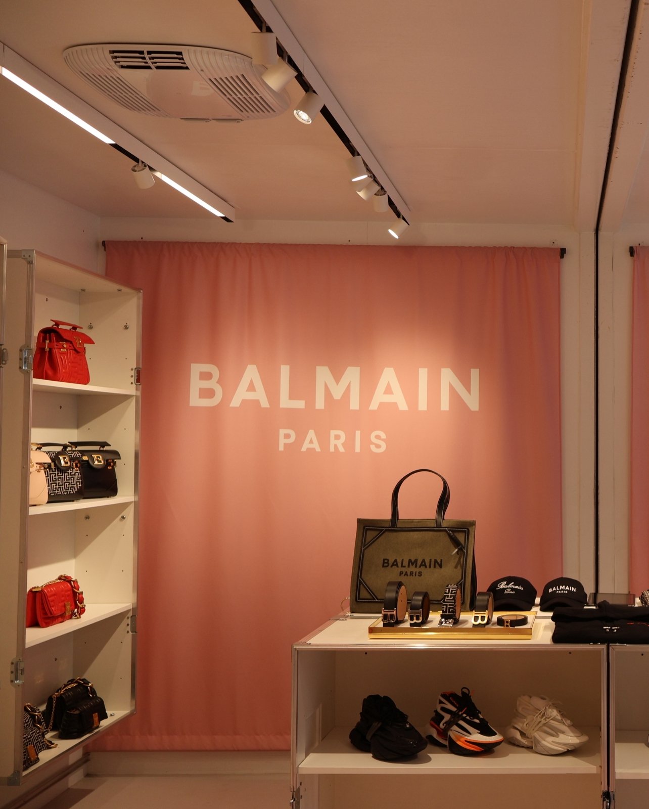 Portrait of the interior of the temporary Balmain storefront at Bal Harbour Shops