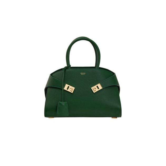 Green leather handbag with gold hardware