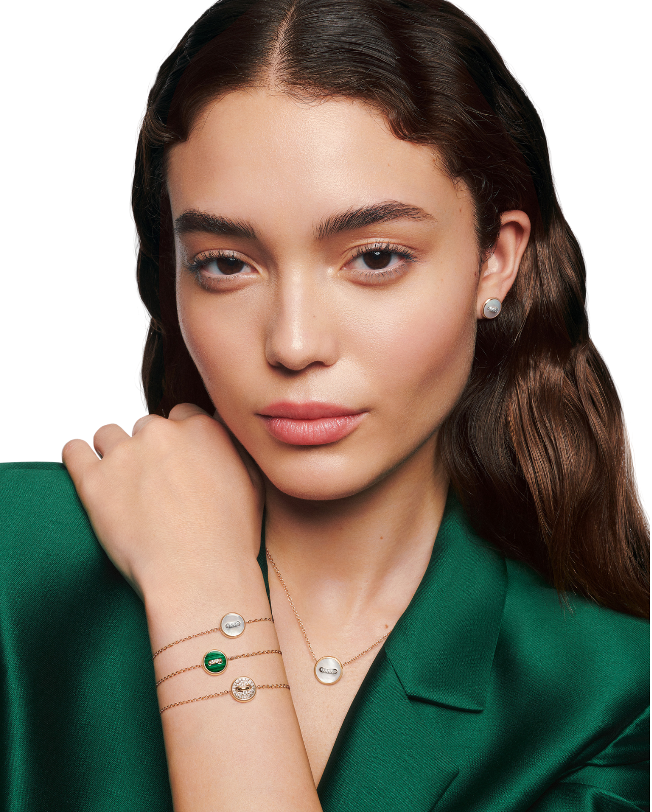 Pomellato campaign with model wearing green silk top with jewelry pieces