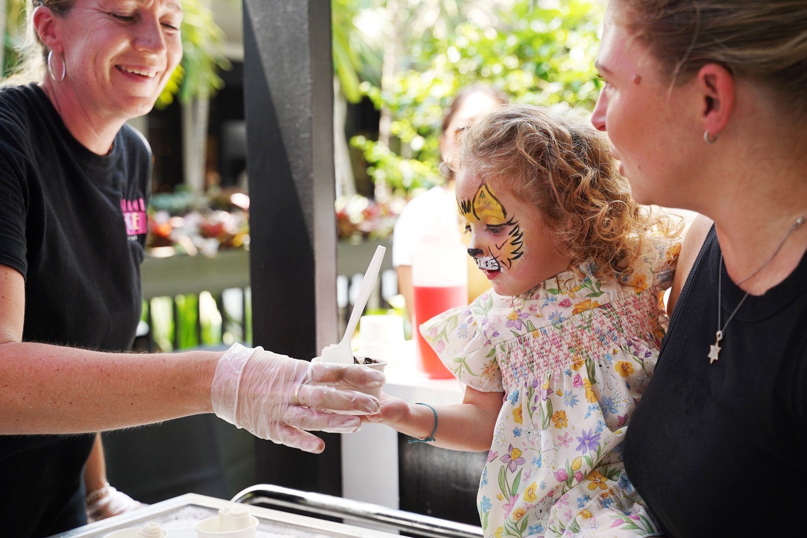 family enjoying Miami 'N' Ice offerings at Ice Cream We Love