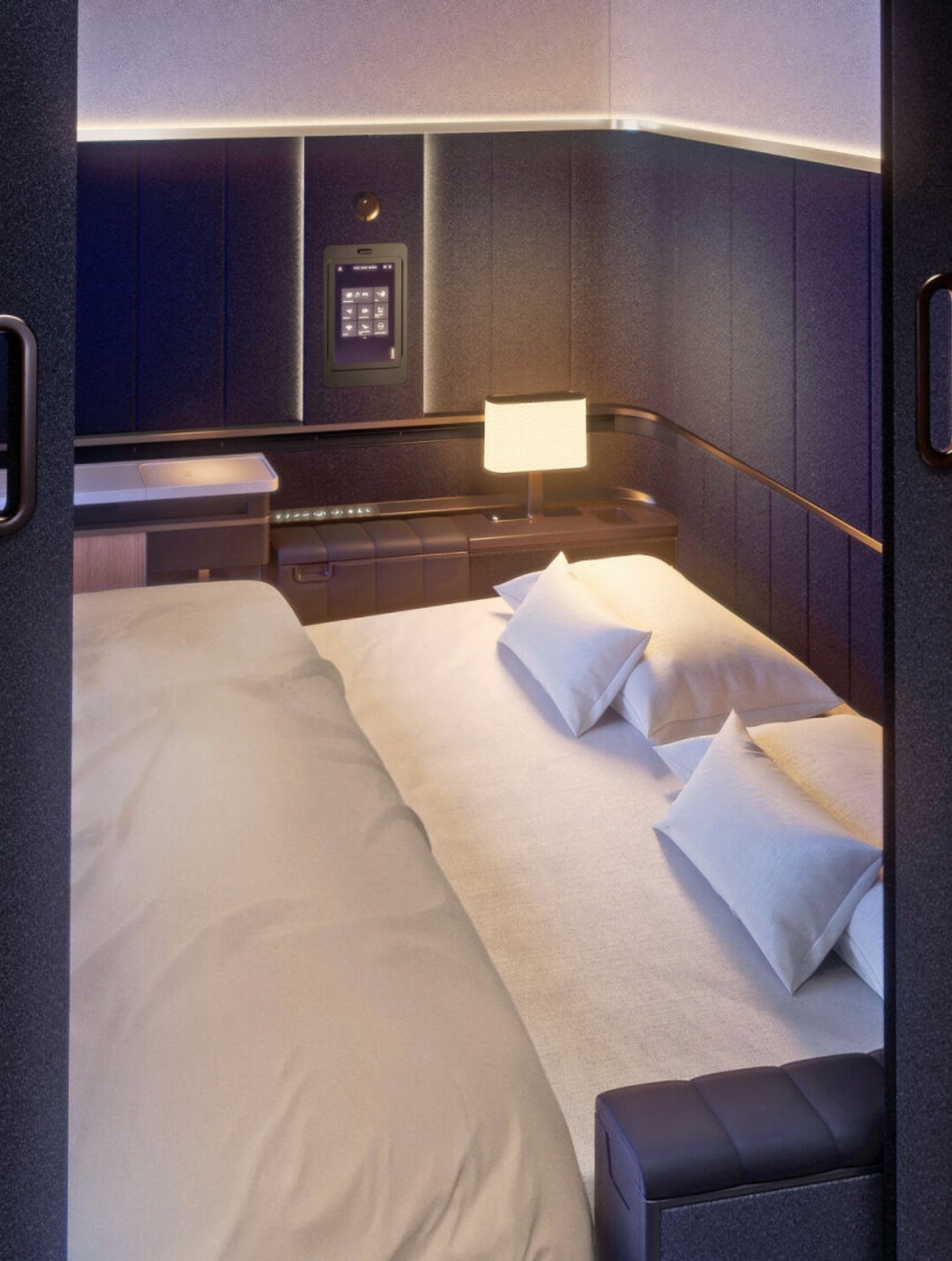 Photo of a Lufthansa Airlines cabin featuring a double bed setup