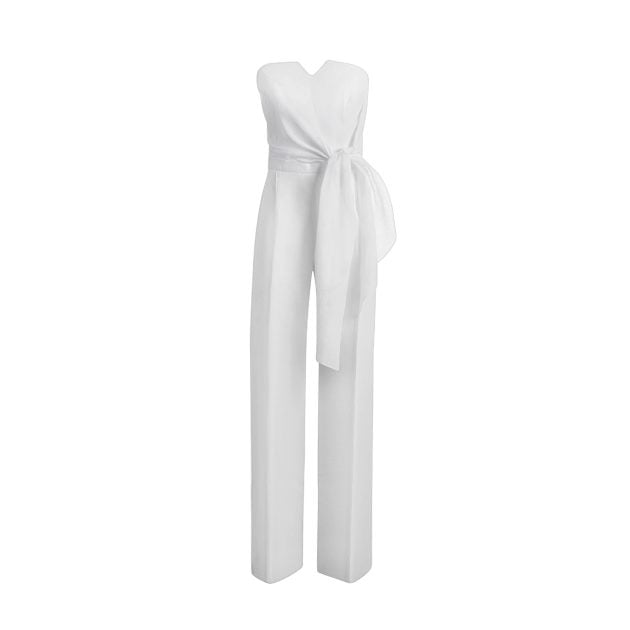 100% Capri strapless white jumpsuit featuring a bow-tied waist