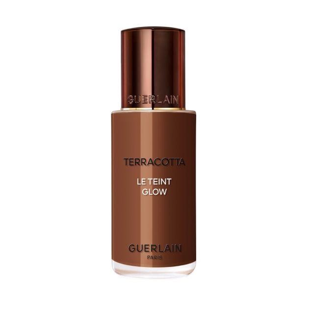 Alt Text: Guerlain Terracotta Le Teint Glow foundation with a bronze cap