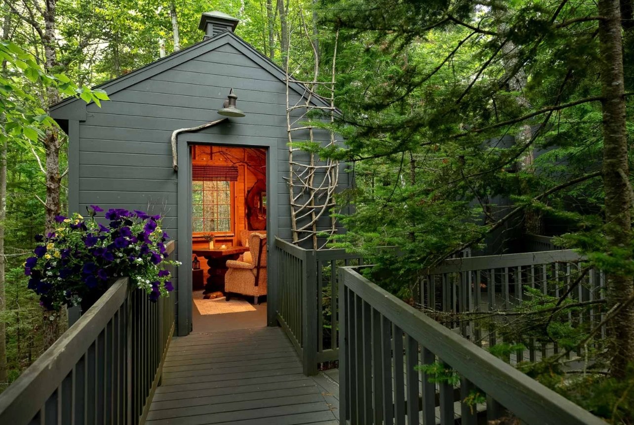 An exterior shot of a treehouse suite at Hidden Pond, Kennebunkport in Maine