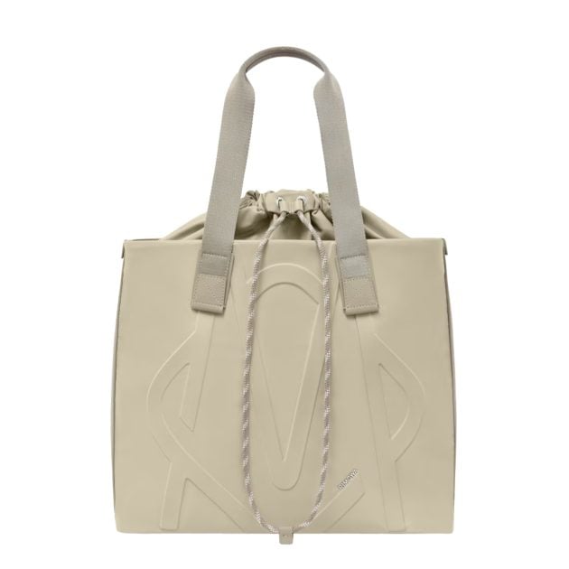 Rimowa sand beige sliding tote with a travel strap and external pockets to conveniently fix onto a suitcase