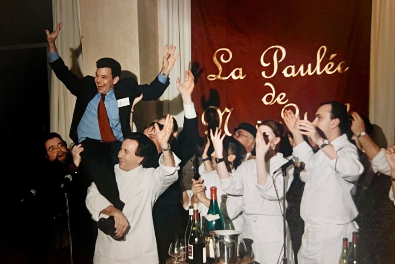 A group shot of chefs celebrating La Paulée de New York during an inaugural event in 2000