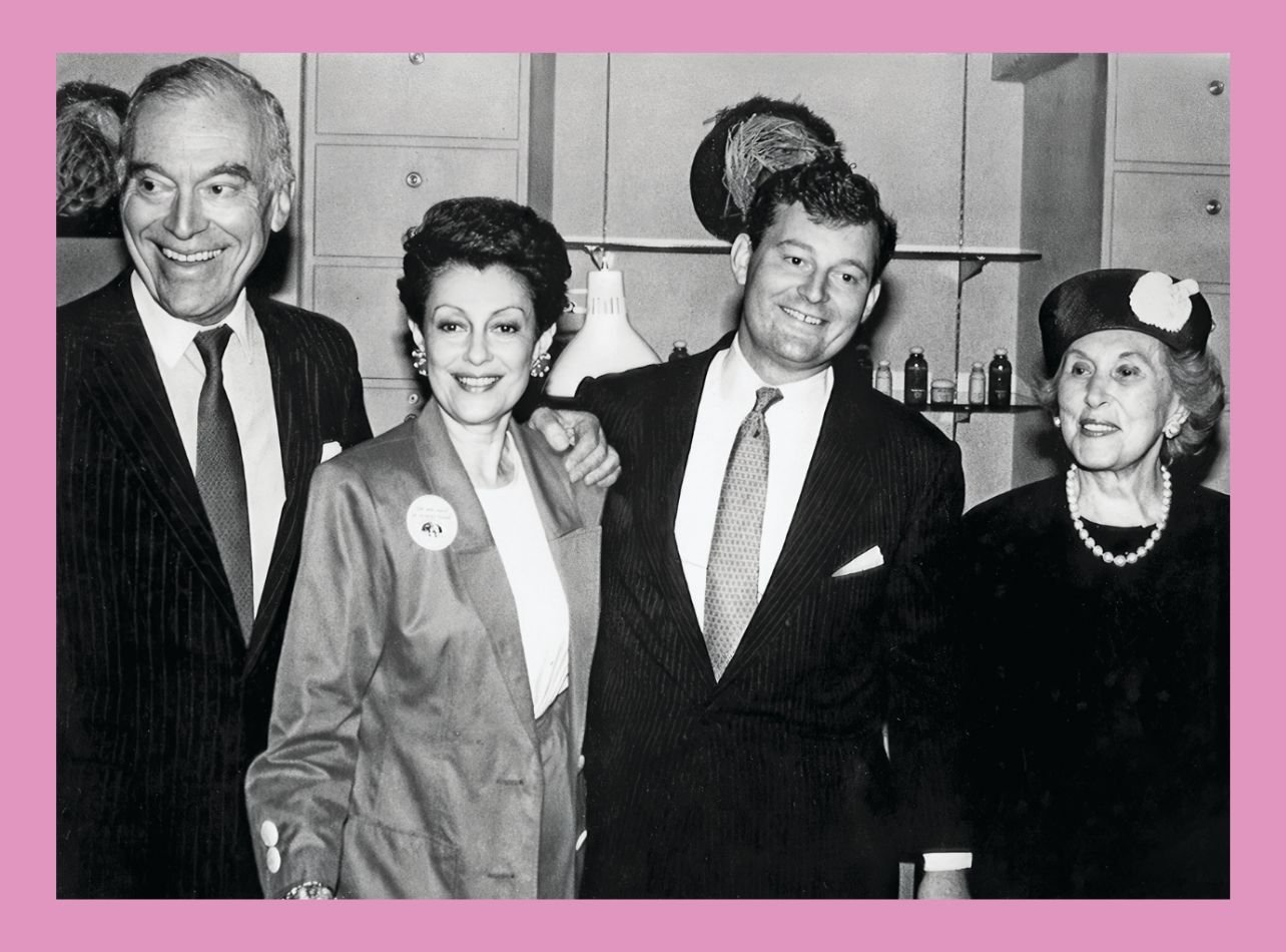 Black and white portrait of Leonard, Evelyn, William, and Estée Lauder at the launch of Origins at Bergdorf Goodman, 1990