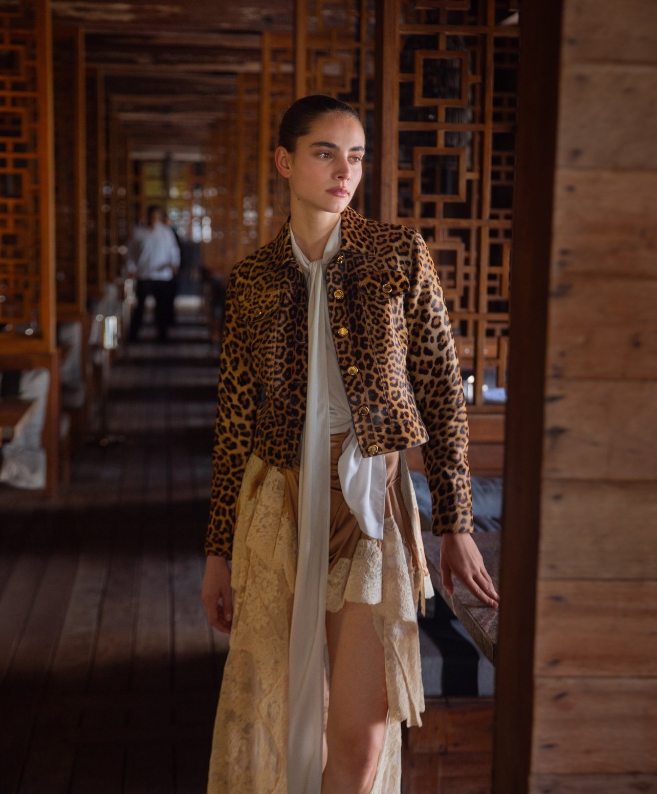 Fashion model with a leopard jacket and lace skirt
