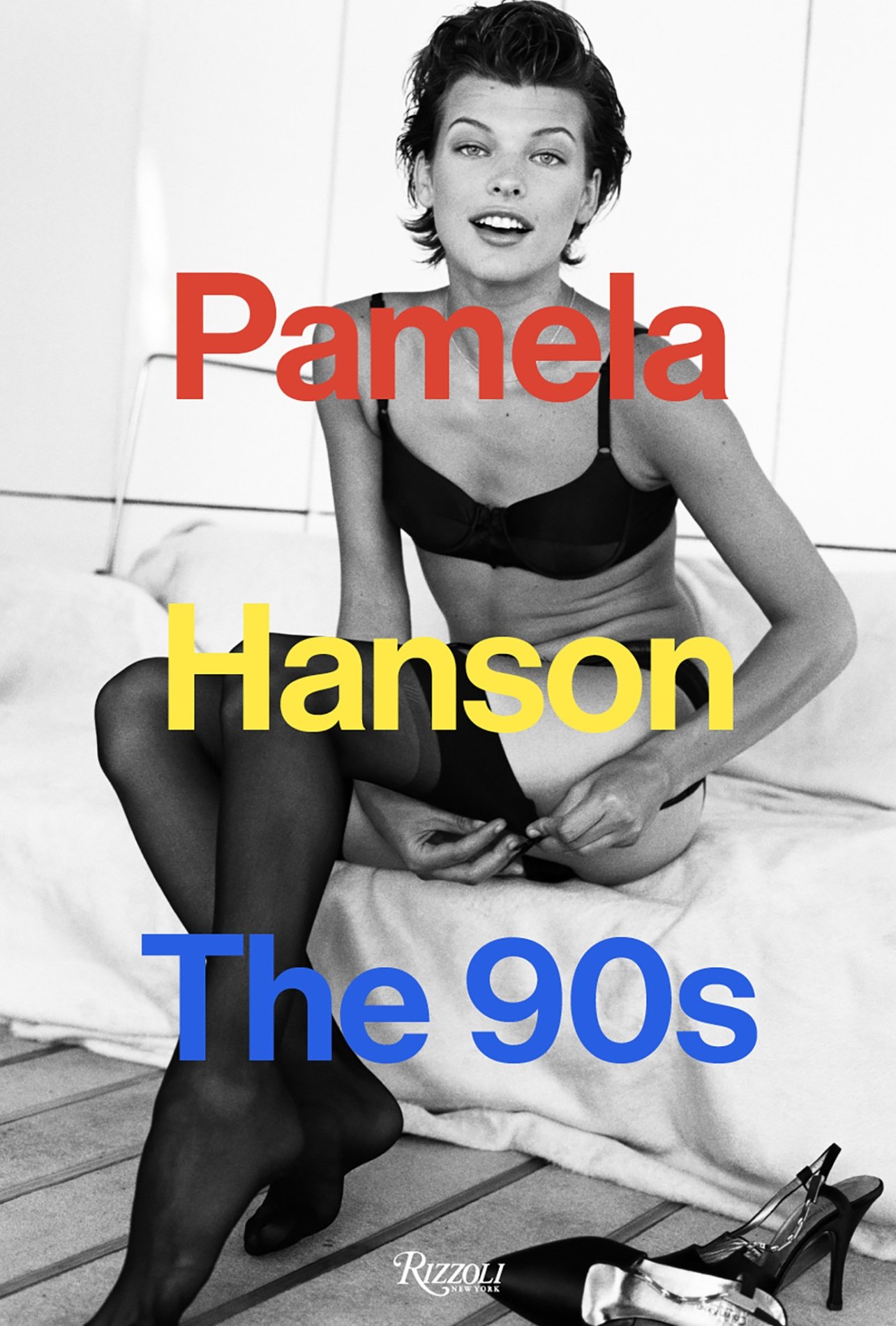A black and white photo of a fashion model in black stockings and a bra on the cover of the book, “Pamela Hanson The 90s.”