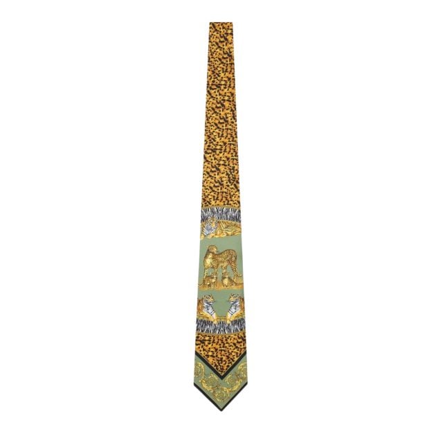 Versace silk tie featuring a wild cat print with lions, tigers, and zebra patterns