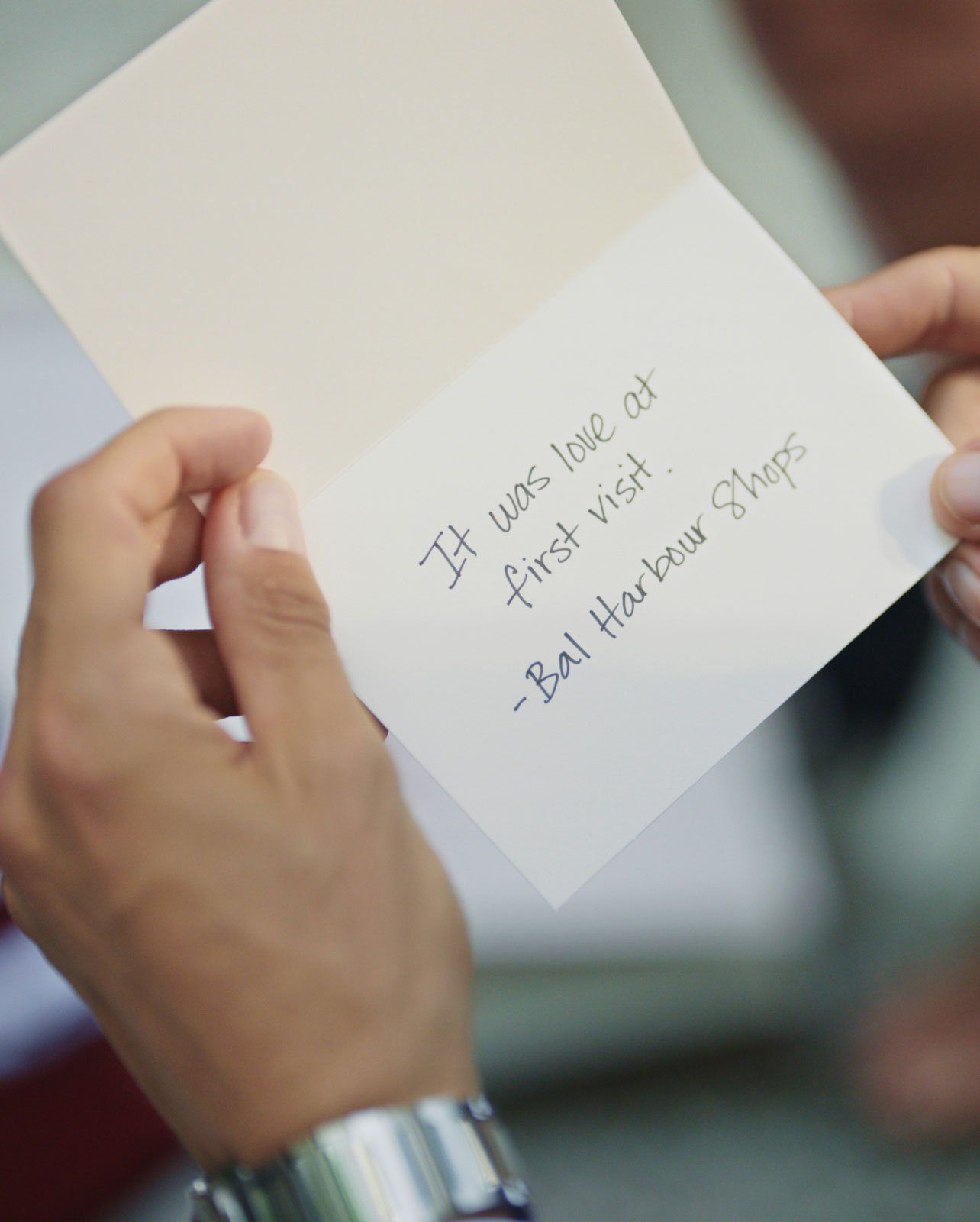 Hand holding notecard