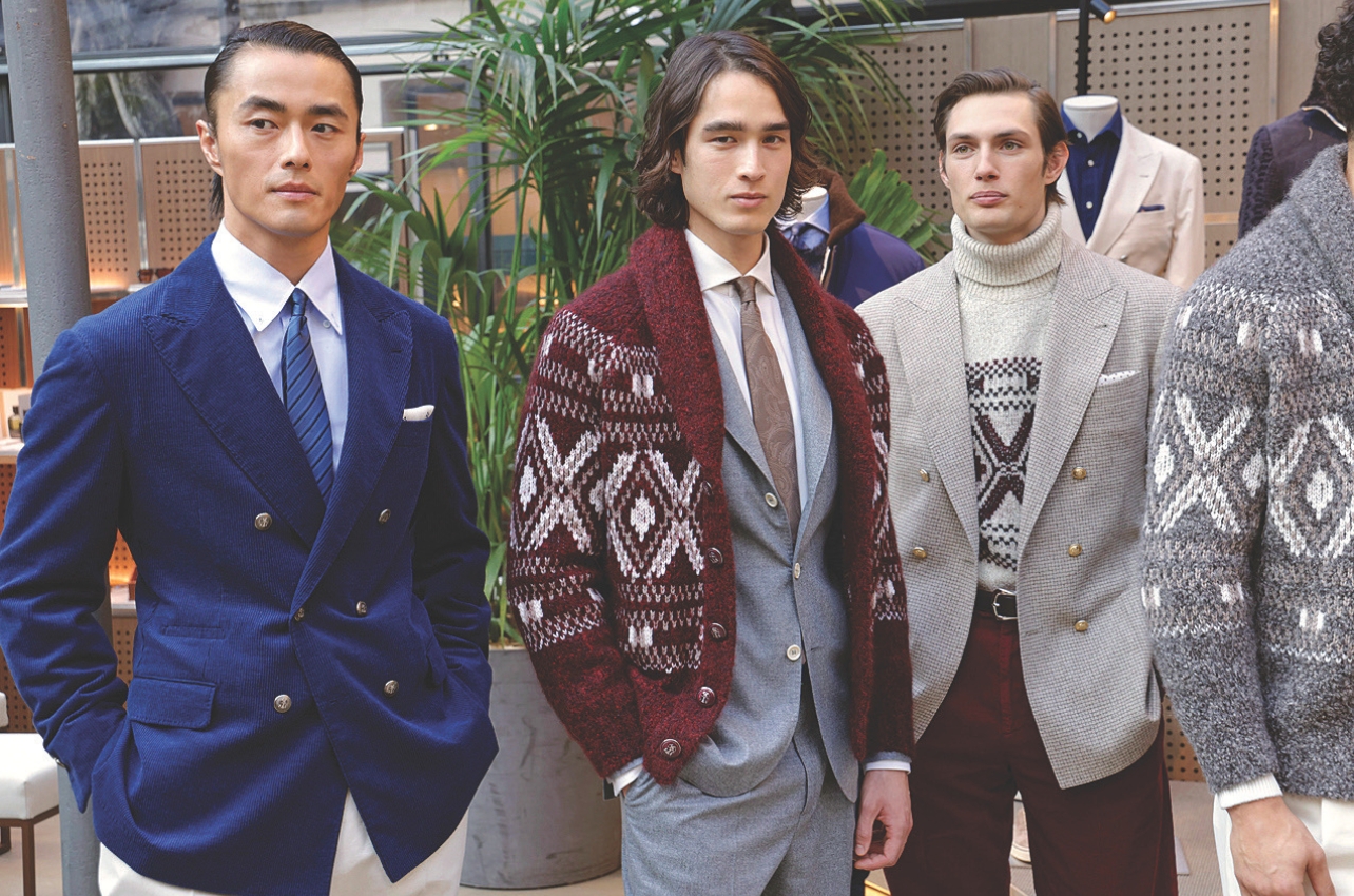 Three fashionable men at men’s collection featured preppy looks and a nod to British patterns and tailoring
