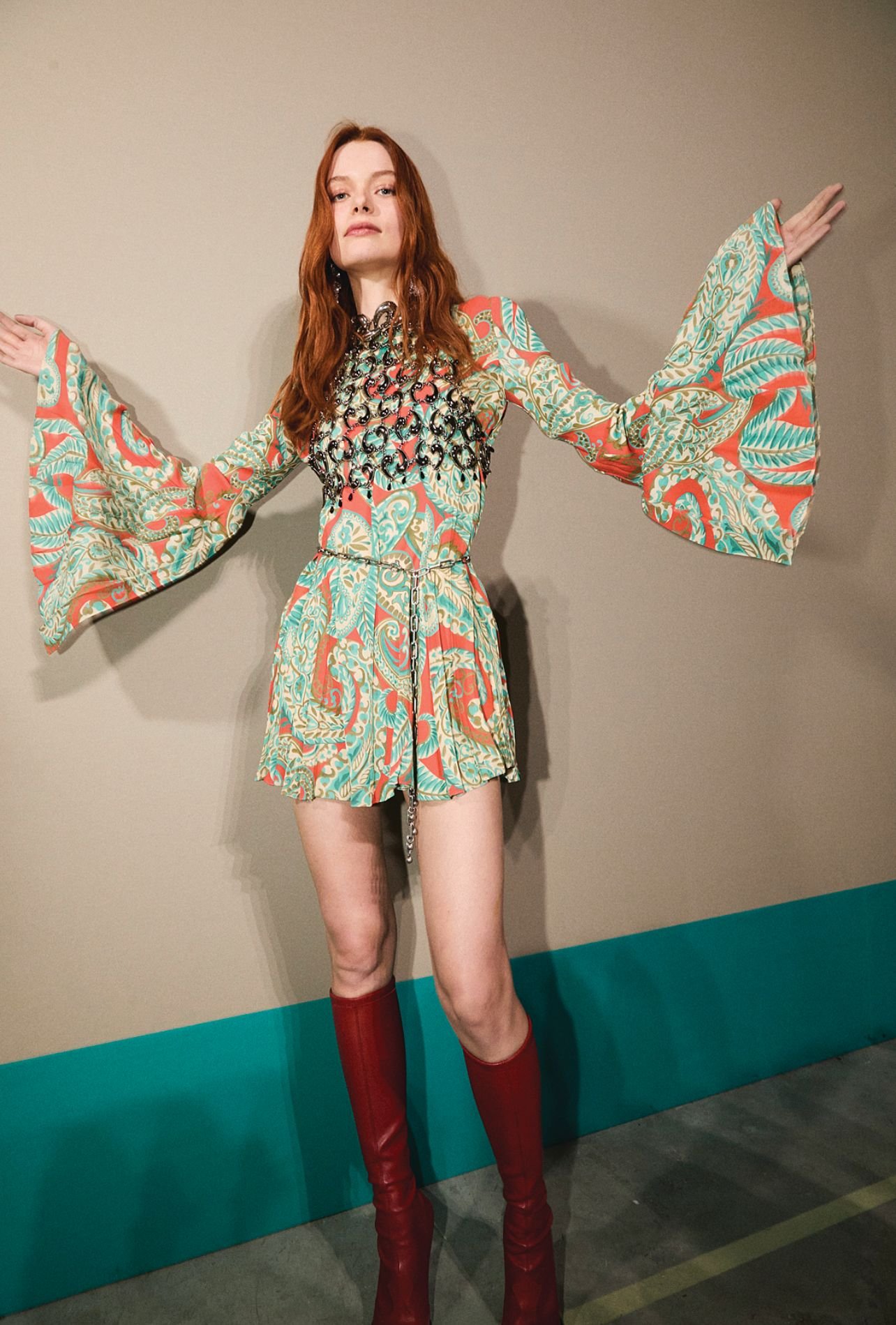 Etro model in a mini dress with flare sleeves