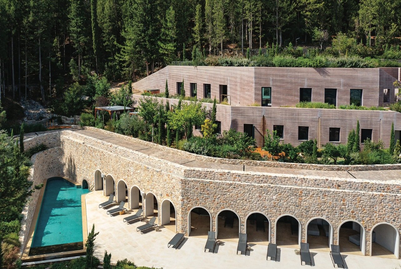 exterior of residences at a euphoria Retreat surrounded by trees