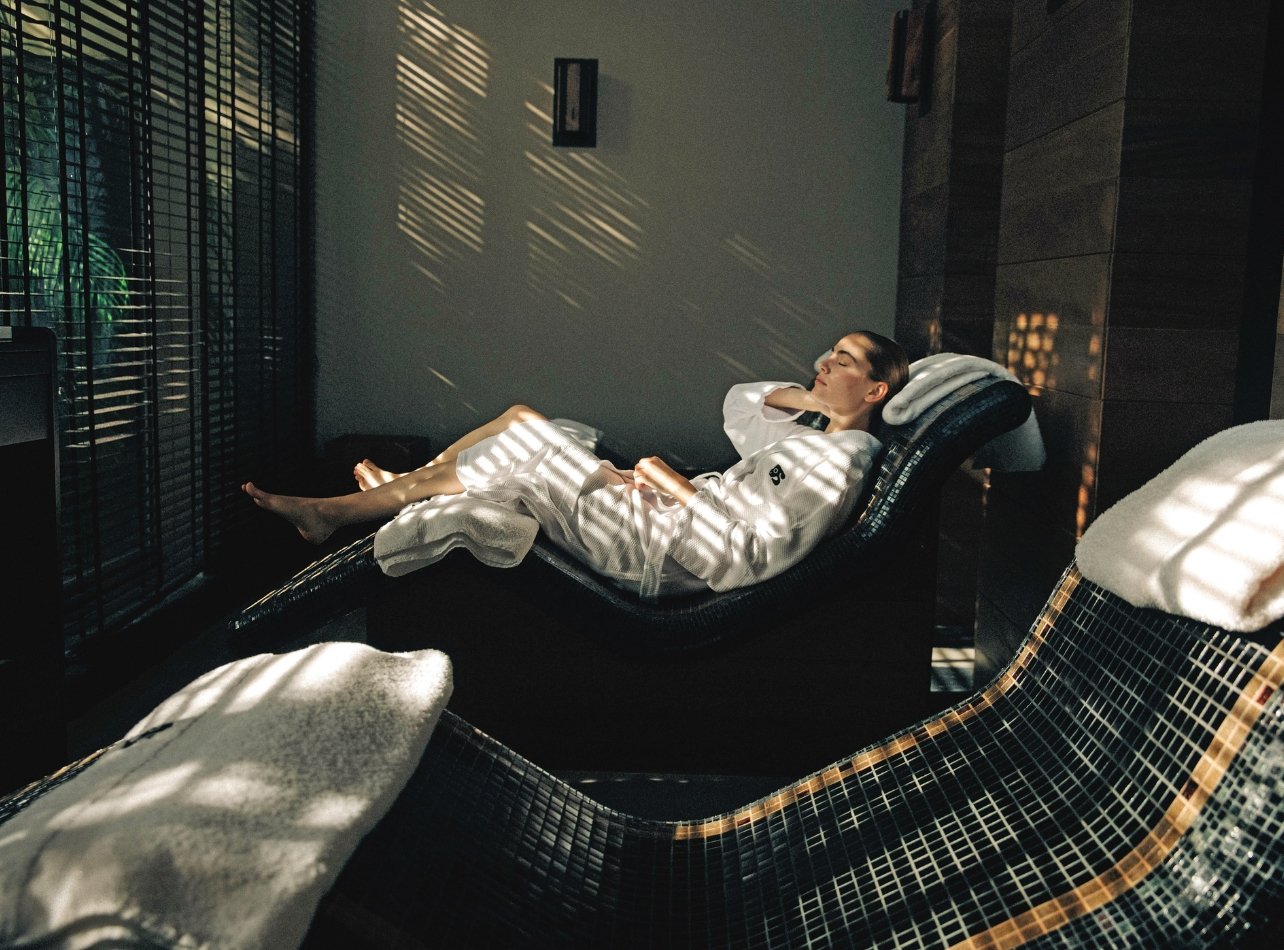 A woman attending wellness services in the spa at Nizuc Resort and Spa