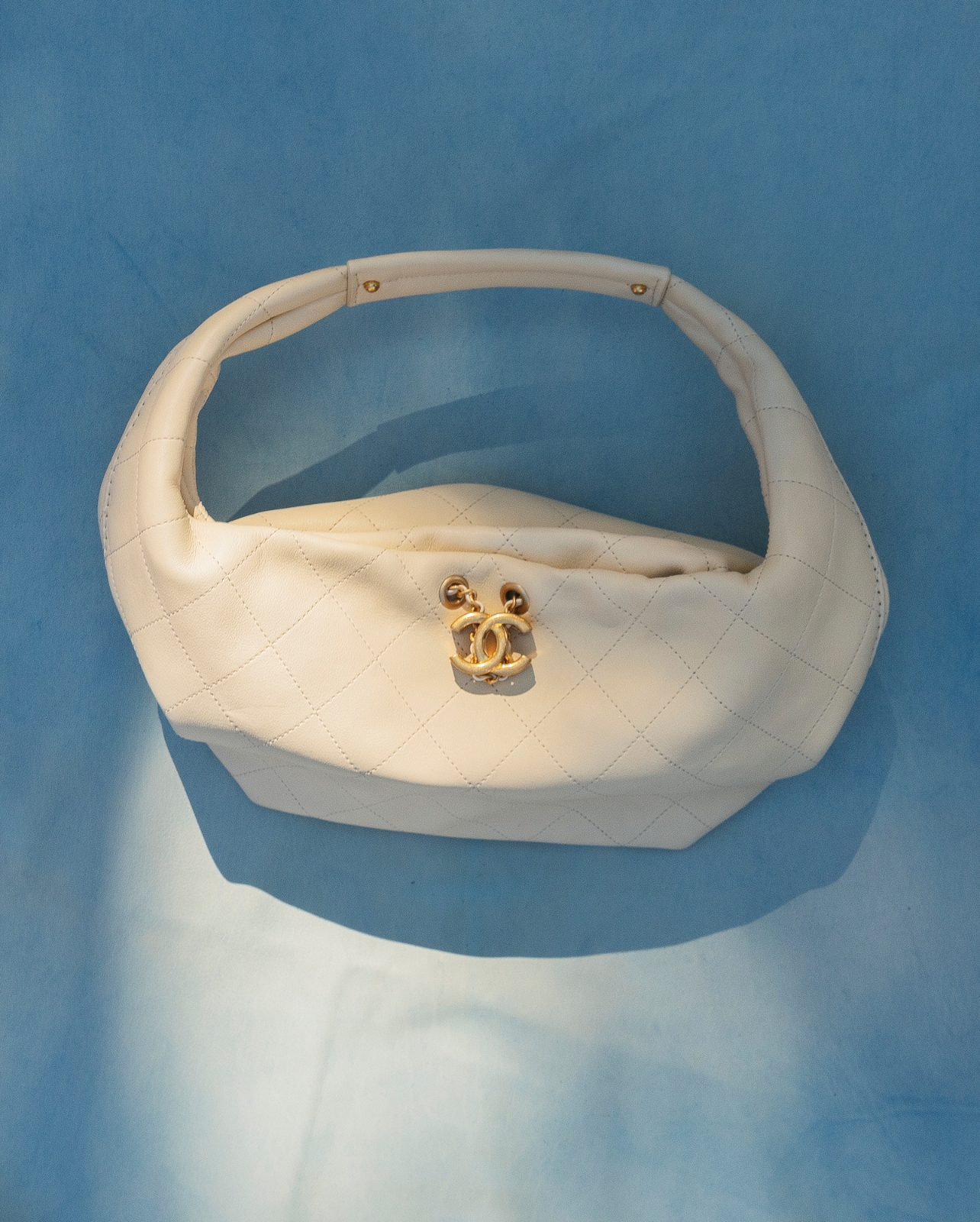 Chanel cream purse with gold hardware