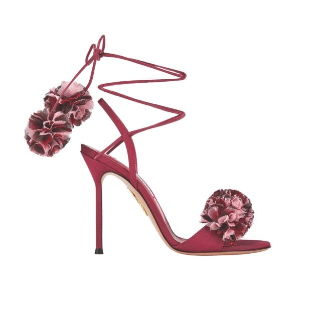 Aquazzura cherry colored heels with pom poms