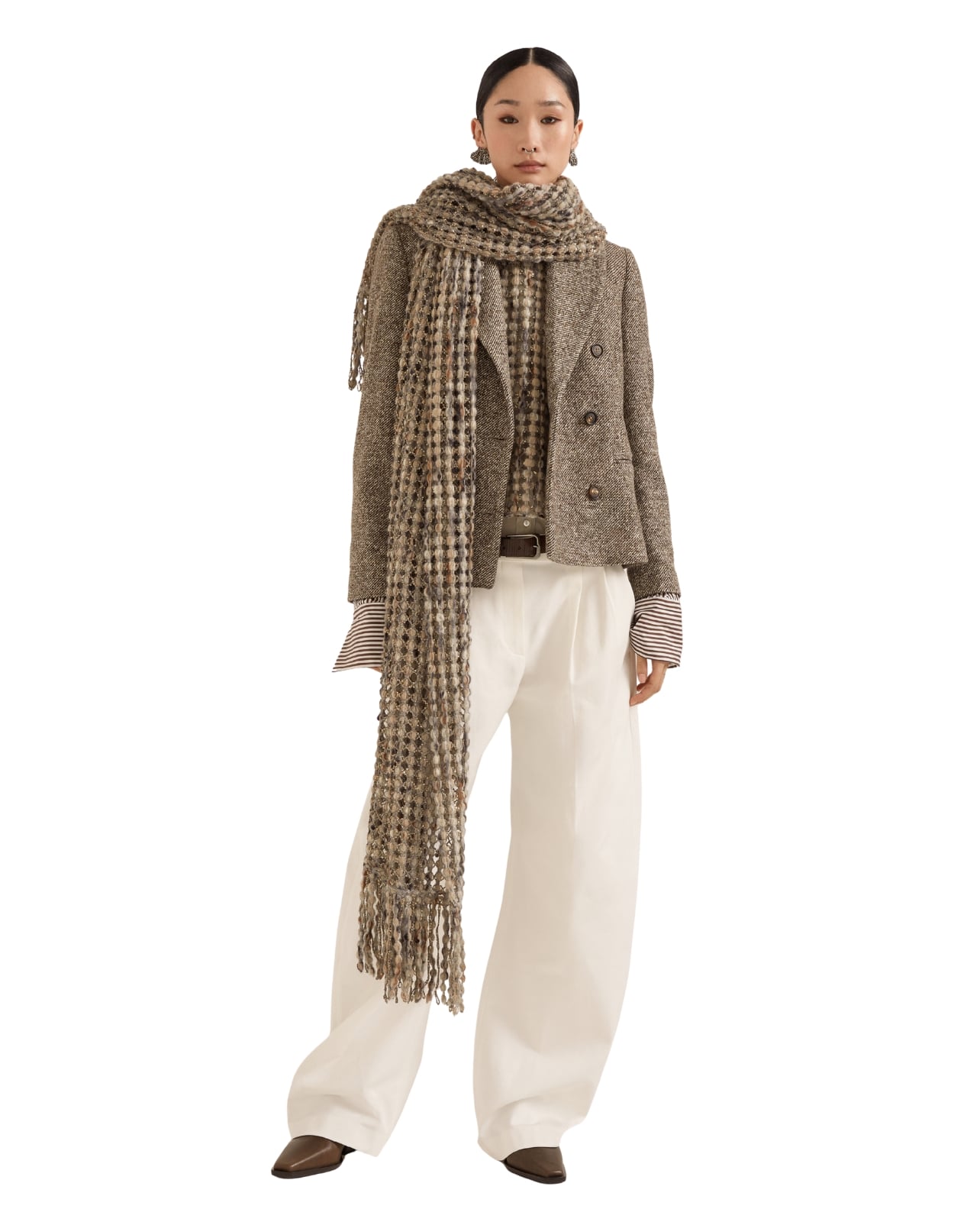 Brunello Cucinelli runway model in a blazer and white pants