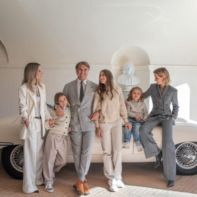 A family portrait of Brunello Cucinelli and his daughters and grandchildren at home in Solomeo, Italy
