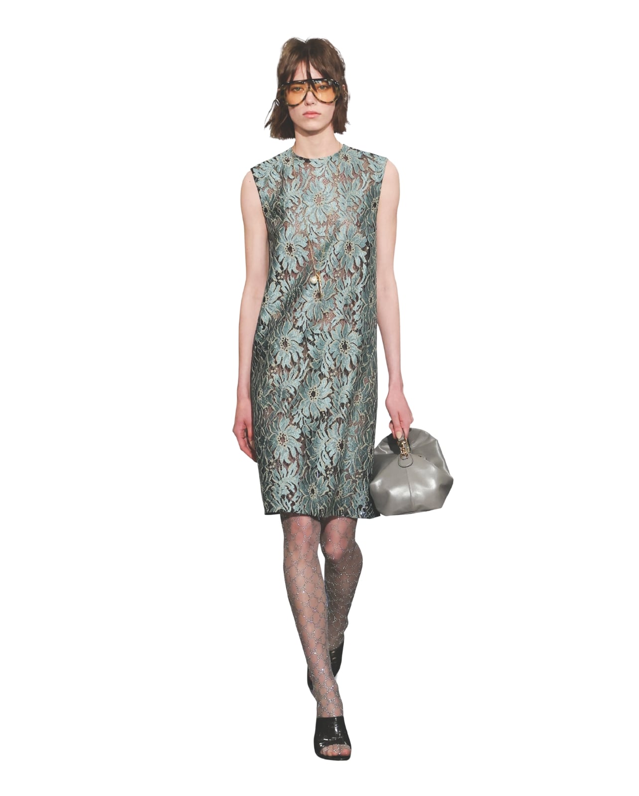 Gucci runway model wearing a blue lace dress