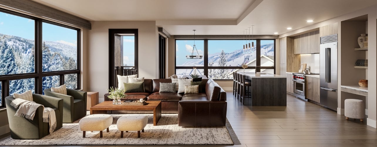 Interior of a hotel suite with a scenic mountain view at Kindred Resort