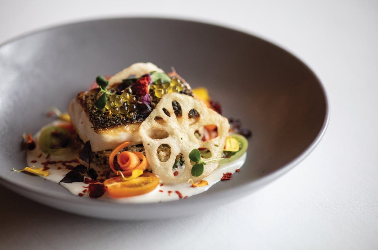 A dish of food with fish and vegetables from Trattoria Dell’Alpe restaurant