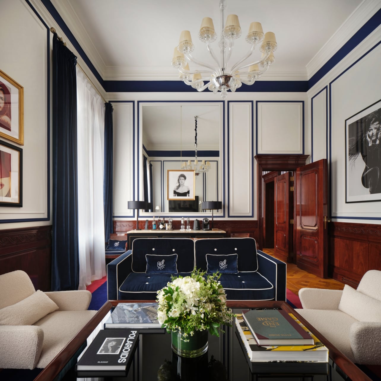 The executive suite at Cipriani in Milano with dark wood and navy-blue accents