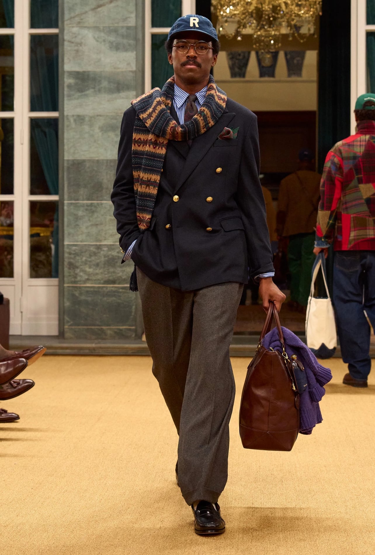 Runway model wearing a Ralph Lauren look from Fall 2026 Men’s Fashion Week